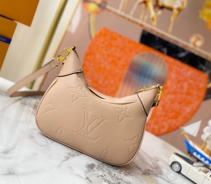Louis Vuitton Monogram Empreinte Leather Bagatelle Mini Hobo In Beige angle 2