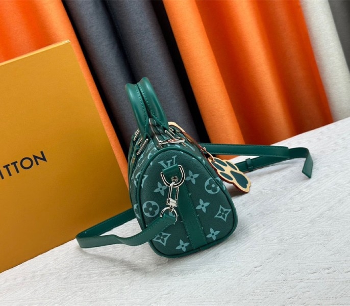 Louis Vuitton Monogram Heritage Canvas Keepall Bandouliere 25 In Green angle 4