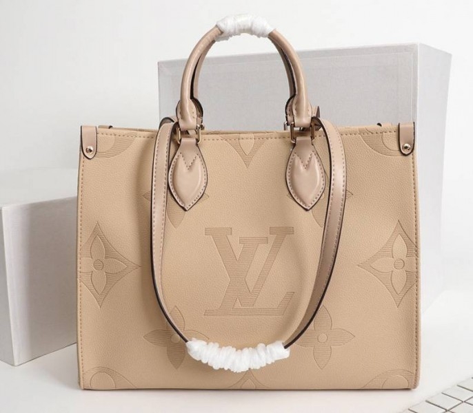 Louis Vuitton Monogram Empreinte Giant Onthego MM Bag In Beige