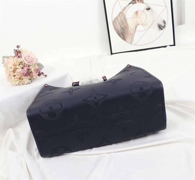 Louis Vuitton Monogram Empreinte Giant Onthego GM Tote In Navy Blue angle 5