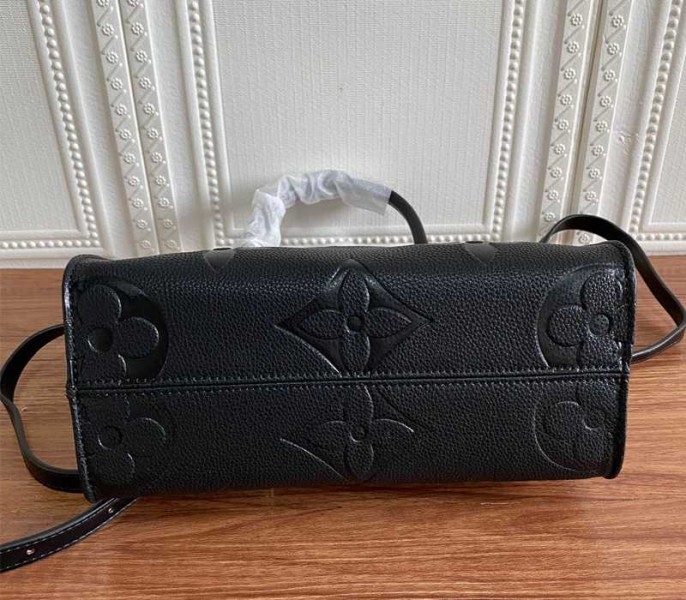 Louis Vuitton Monogram Empreinte Leather Onthego PM Bag In Black angle 5