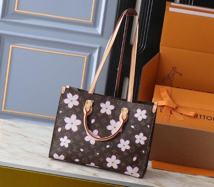 LV X TM Monogram Canvas Onthego MM With Cherry Blossom angle 2