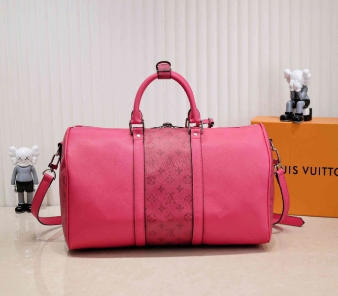 Louis Vuitton Taiga Leather Keepall Bandouliere 50 Travel Bag In Pink angle 3