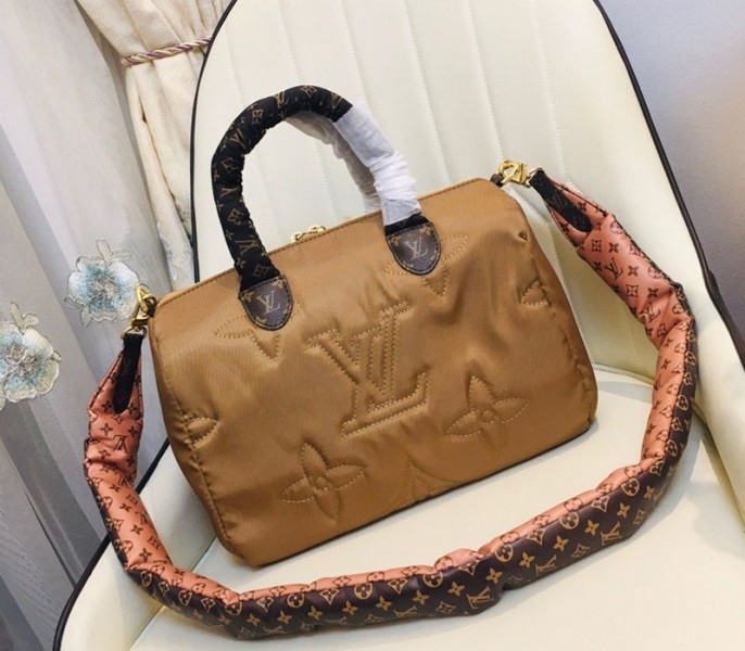 Louis Vuitton Econyl Regenerated Nylon Speedy Bandouliere 30 Handbag In Beige angle 3