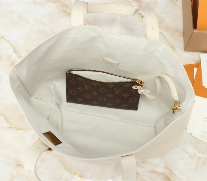 Louis Vuitton Low Key Cabas MM Bag In Quartz White angle 5