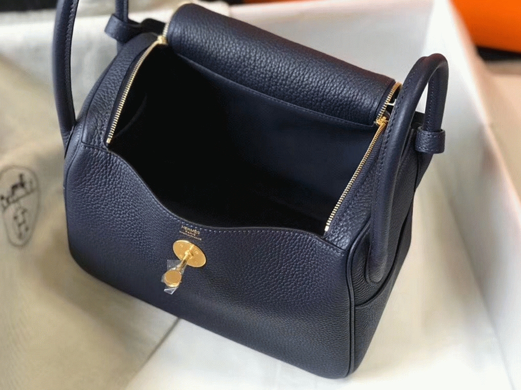 Fake designer Hermes Lindy 26cm handbag in navy blue angle 3