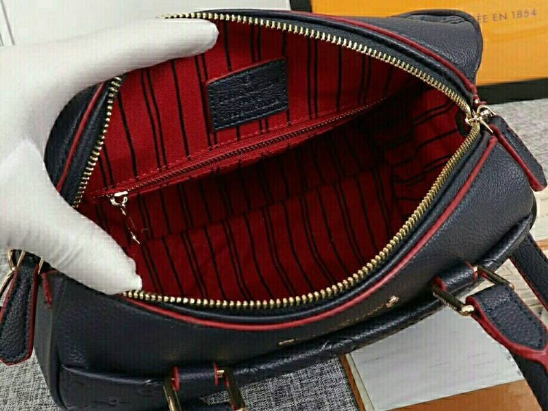 Louis Vuitton Monogram Empreinte Speedy Bandouliere 25 Handbag In Navy Blue angle 5
