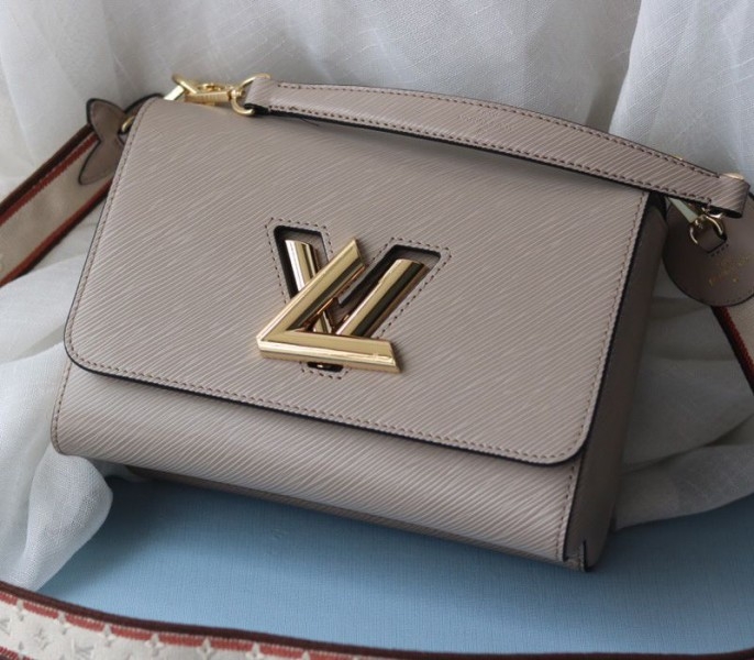 Louis Vuitton Epi Leather Twist MM Handbag In Galet Gray With Embroidered Strap angle 2