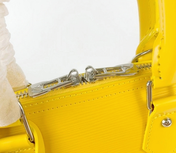 Louis Vuitton Epi Leather Alma BB Handbag In Cedrat Yellow With Jacquard Strap angle 2