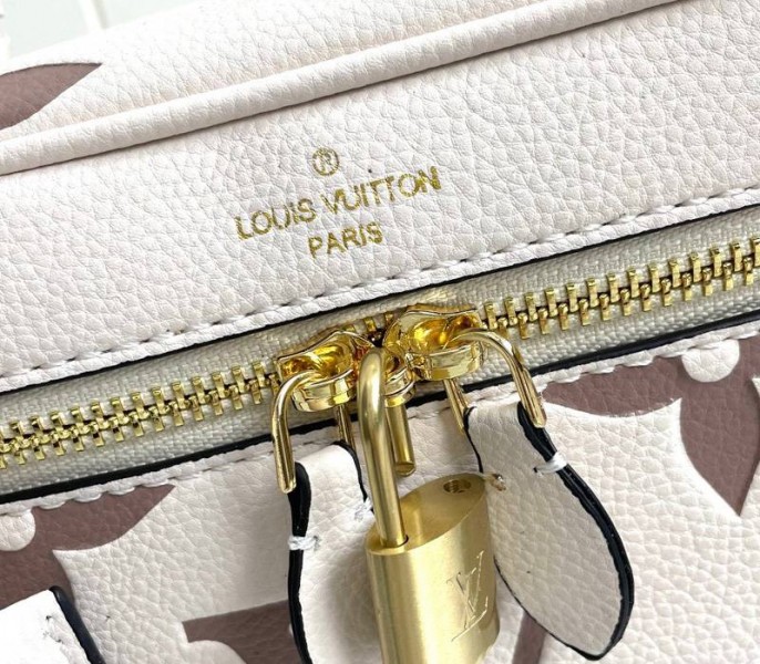 Louis Vuitton Bicolor Monogram Empreinte Vanity PM Bag In Cream And Bois De Rose Pink angle 5