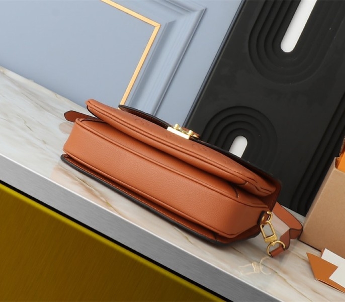 Louis Vuitton Monogram Empreinte Metis Handbag In Cognac Brown angle 3