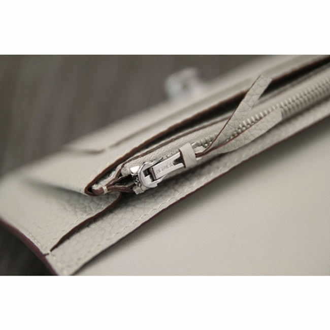 White fake Hermes Dogon combine wallet angle 2