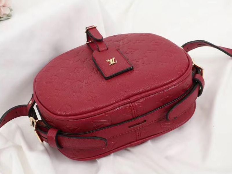 Louis Vuitton Monogram Empreinte Boite Chapeau Souple MM Bag In Red angle 4
