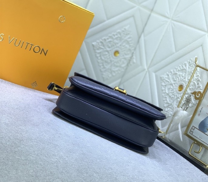 LV Monogram Empreinte Leather Metis In Navy Blue angle 4