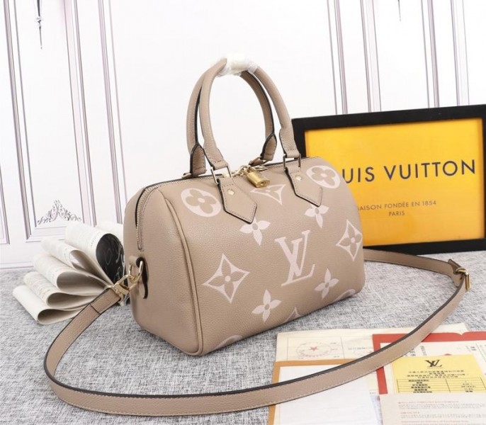 Louis Vuitton Bicolor Monogram Empreinte Leather Speedy Bandouliere 25 Handbag In Tourterelle Gray And Cream angle 2