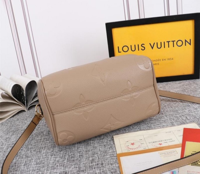 Louis Vuitton Monogram Empreinte Leather Speedy Bandouliere 25 Handbag In Tourterelle Gray angle 4