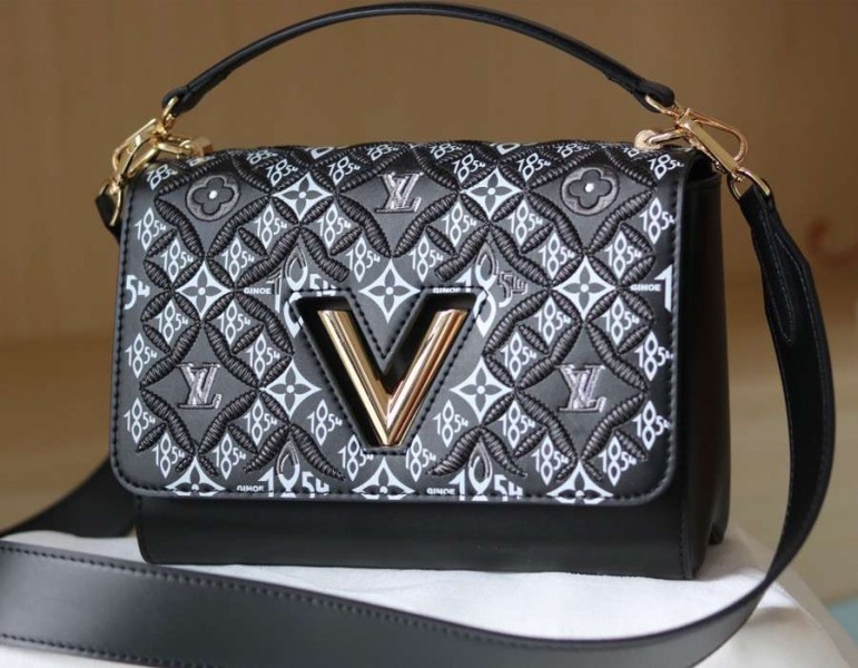 Louis Vuitton Since 1854 Twist MM Bag angle 2