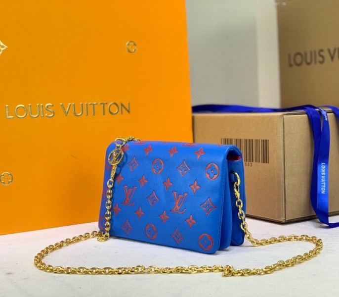 Louis Vuitton Coussin Pochette In Blue And Red angle 2