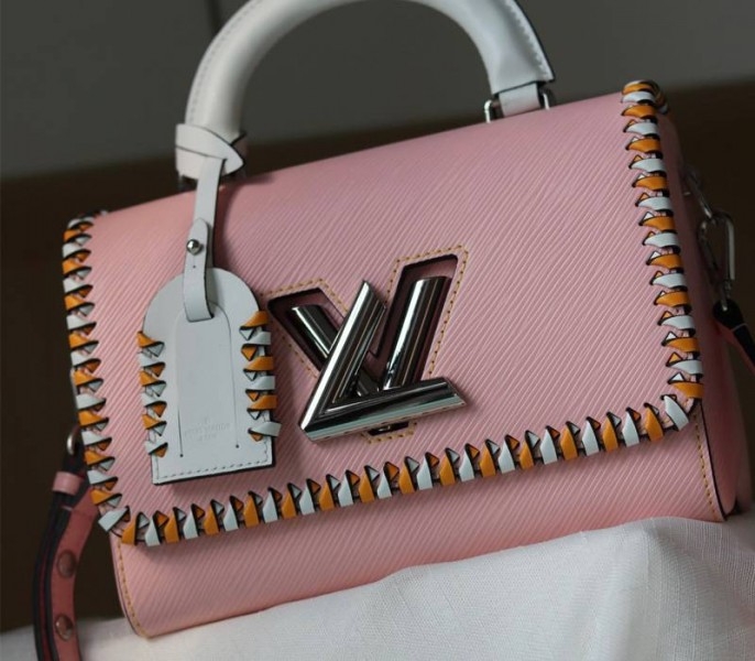 Louis Vuitton Epi Leather Twist MM Bag In Rose Bellerin Pink With Braided Edges Flap angle 2