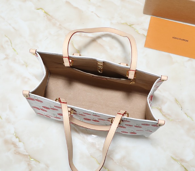 X TM Monogram Cherry Canvas Onthego MM In White Style 1 angle 3