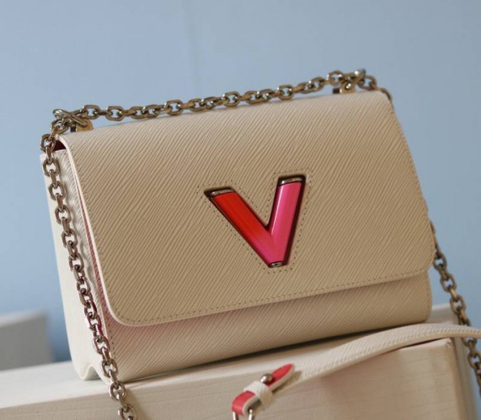 Louis Vuitton Epi Leather Twist MM Limited Edition Bag In Quartz White angle 3