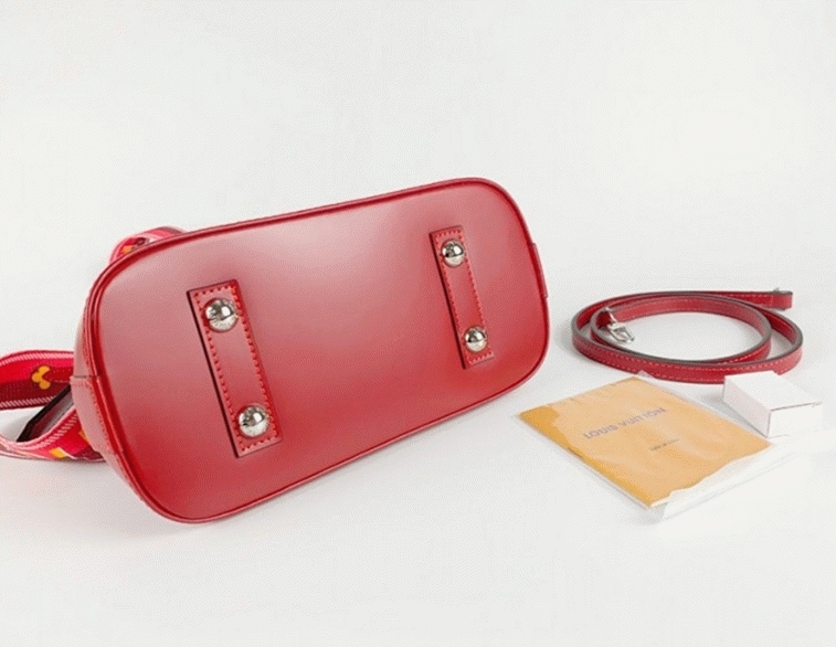 Louis Vuitton Epi Leather Alma BB Handbag In Red With Jacquard Strap angle 4