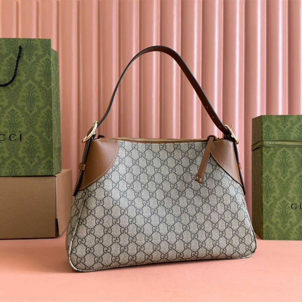 GG Emblem medium shoulder bag angle 3