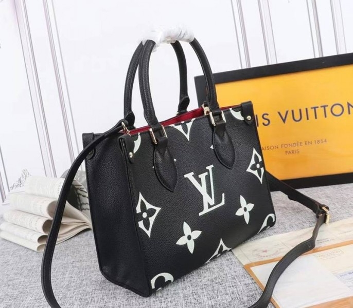 Louis Vuitton Bicolor Monogram Empreinte Leather Onthego PM Bag In Black And Beige angle 2