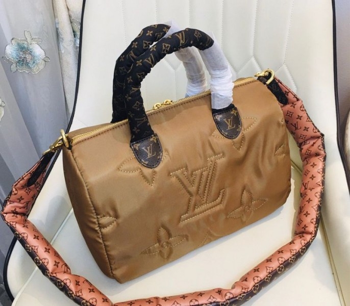 Louis Vuitton Econyl Regenerated Nylon Speedy Bandouliere 30 Handbag In Beige angle 4