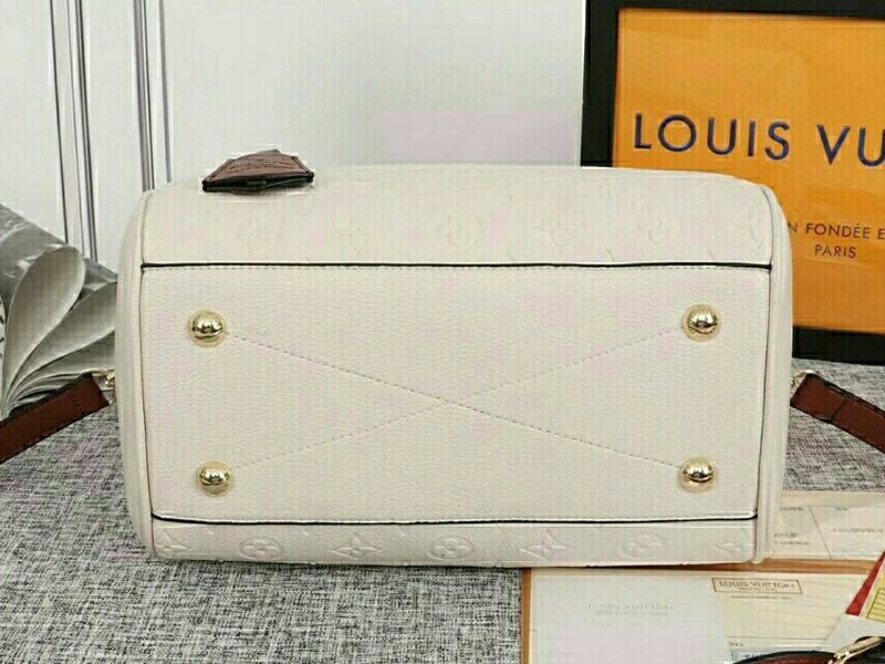 Louis Vuitton Monogram Empreinte Speedy Bandouliere 25 Handbag In Cream angle 4