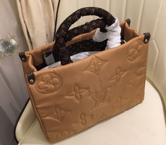 Louis Vuitton Econyl Regenerated Nylon Onthego GM Tote In Beige angle 5