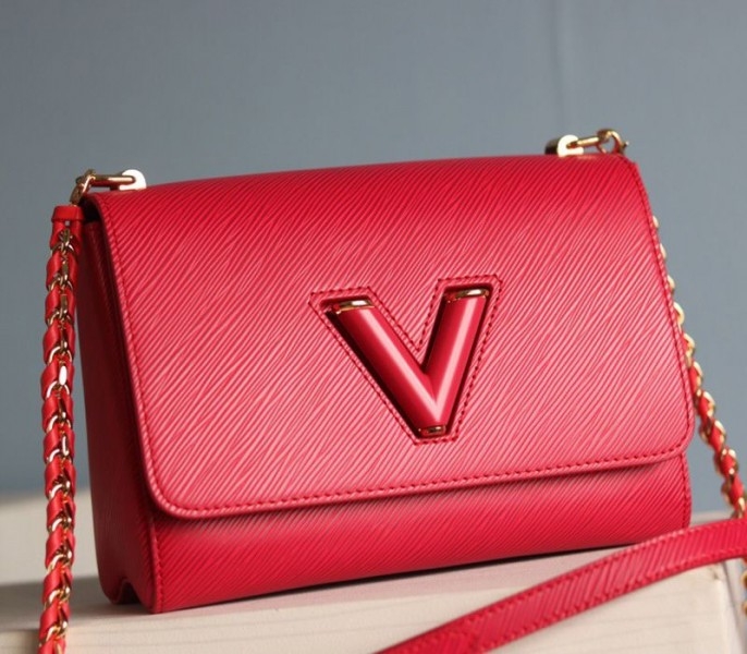 Louis Vuitton Epi Leather Twist MM Bag In Red angle 3
