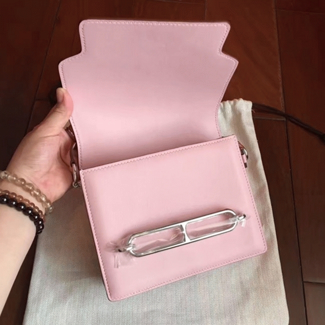 Rose dragee replica Hermes Mini Sac Roulis handbag angle 2