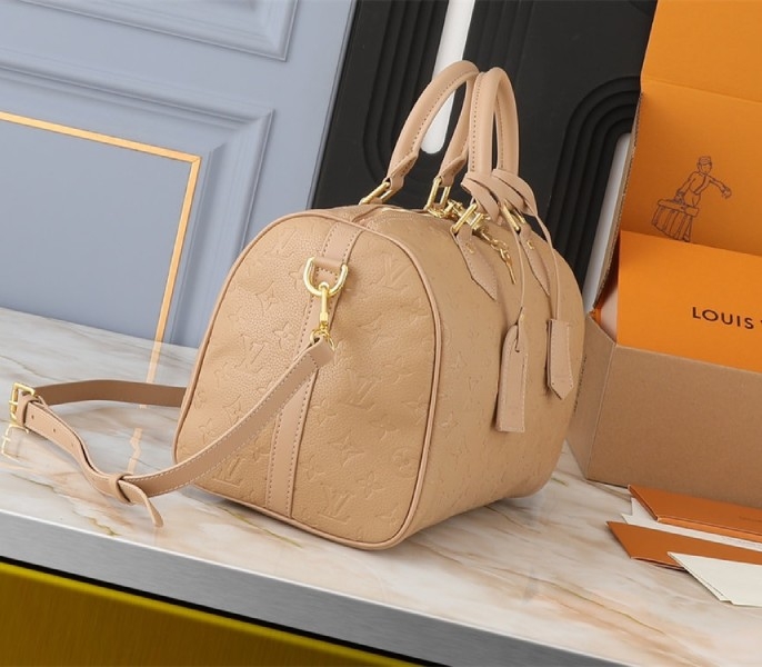 Louis Vuitton Monogram Empreinte Speedy Soft 30 Handbag In Apricot angle 4