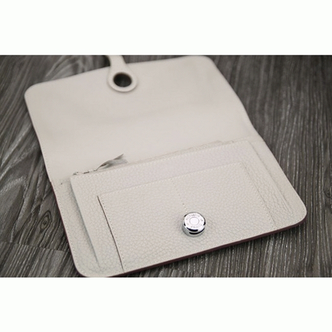 White fake Hermes Dogon combine wallet angle 3