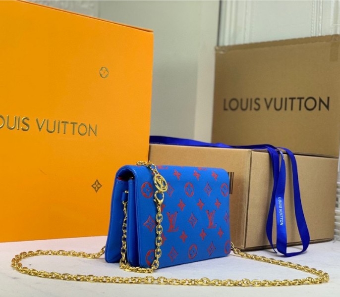 Louis Vuitton Coussin Pochette In Blue And Red angle 3