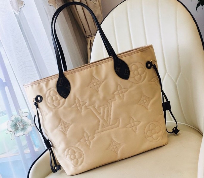 Louis Vuitton Econyl Regenerated Nylon Neverfull MM Tote In Cream angle 4