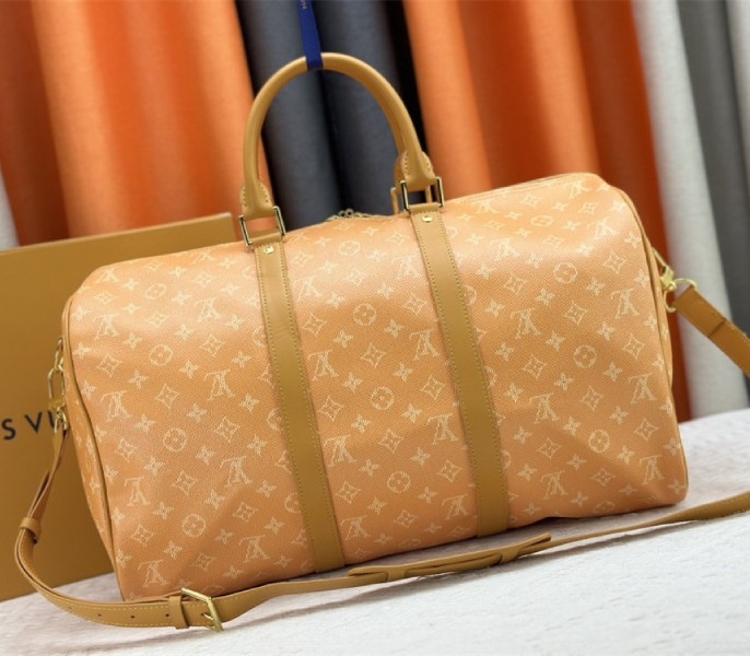 Louis Vuitton Monogram Heritage Canvas Keepall Bandouliere 45 In Yellow angle 3