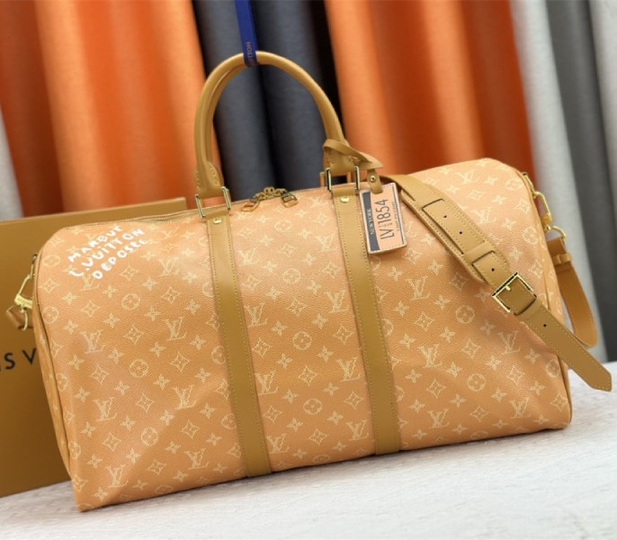Louis Vuitton Monogram Heritage Canvas Keepall Bandouliere 50 In Yellow