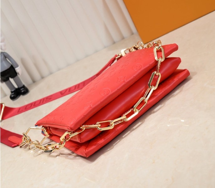 Louis Vuitton Coussin PM Bag In Neon Red With Jacquard Strap angle 4