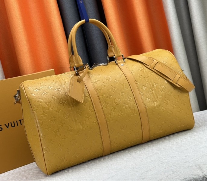 Louis Vuitton Taurillon Leather Keepall Bandouliere 50 In Safran Yellow angle 2