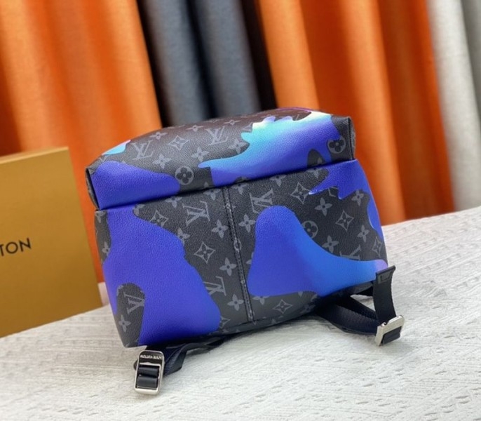 Louis Vuitton Monogram Eclipse Discovery Backpack In Blue Sunrise angle 5