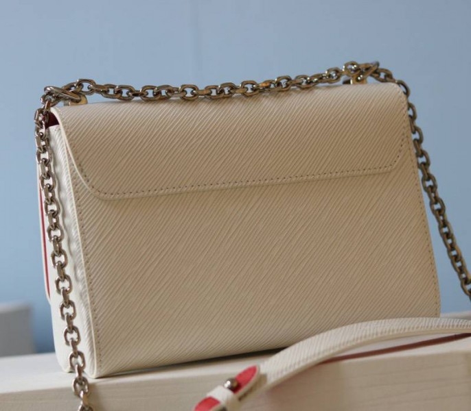 Louis Vuitton Epi Leather Twist MM Limited Edition Bag In Quartz White angle 4