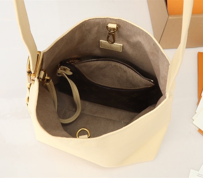 Louis Vuitton Low Key MM Hobo In Urban Yellow angle 3