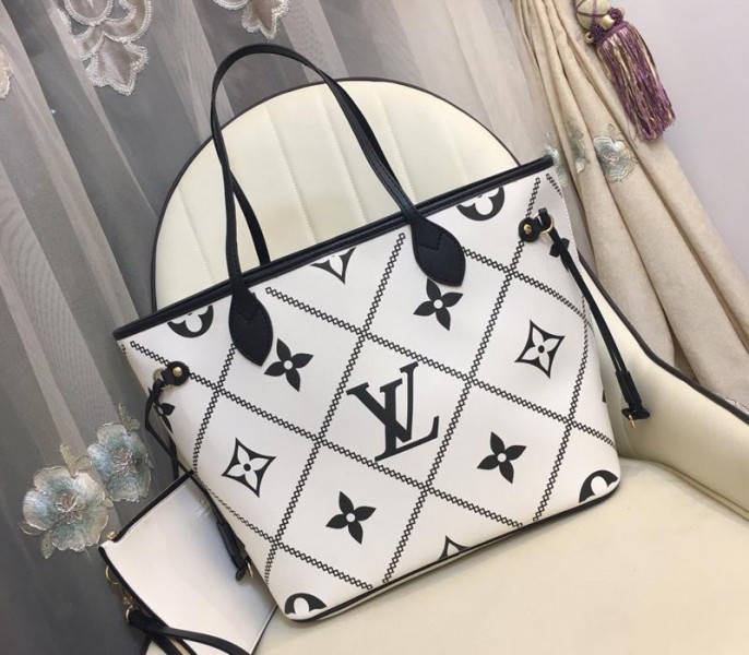 Louis Vuitton Spring 2022 Monogram Empreinte Neverfull MM Tote In Cream angle 2