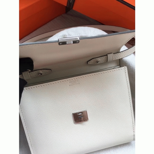 White top knockoff Hermes Clic wallet with strap angle 2