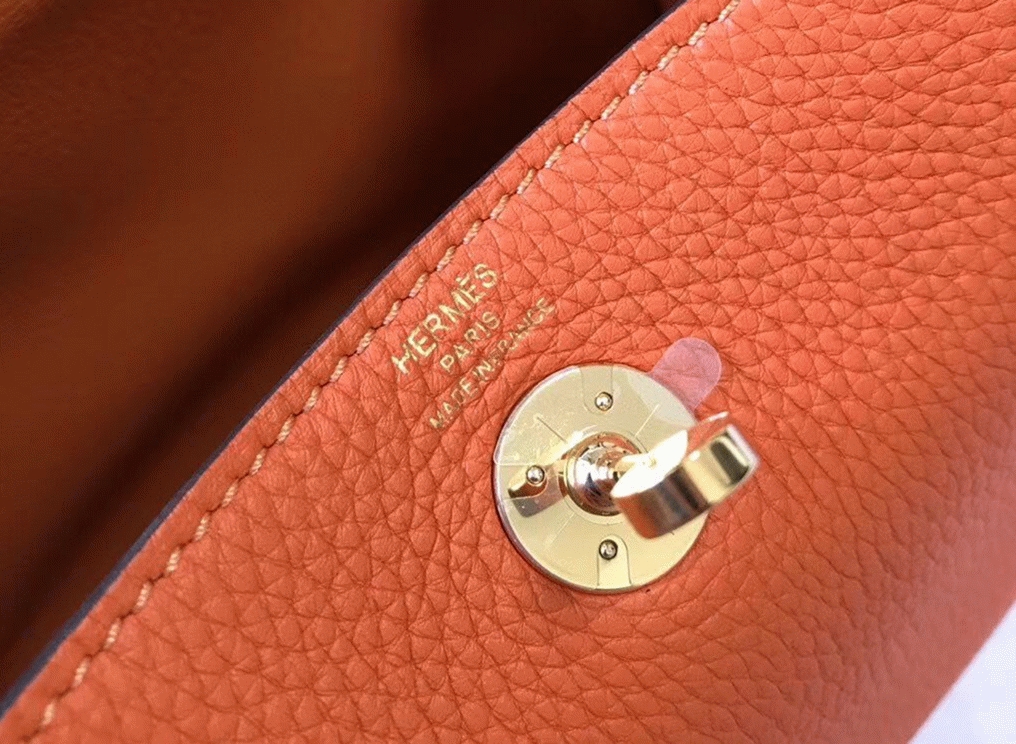 Replica Hermes Lindy Mini handbag in orange color angle 2