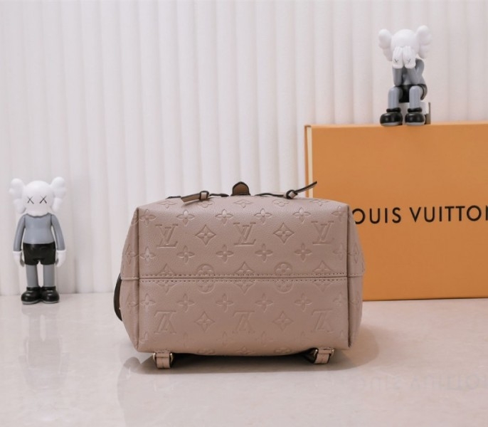 Louis Vuitton Monogram Empreinte Leather Montsouris PM Backpack In Tourterelle Gray angle 3