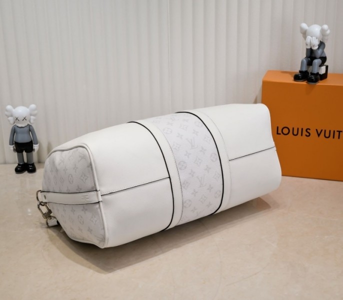 Louis Vuitton Taiga Leather Keepall Bandouliere 50 Travel Bag In White angle 4