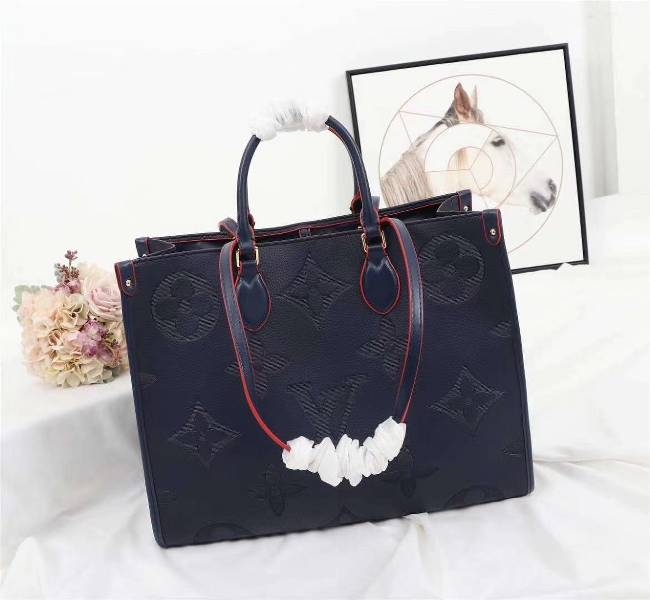 Louis Vuitton Monogram Empreinte Giant Onthego GM Tote In Navy Blue angle 2
